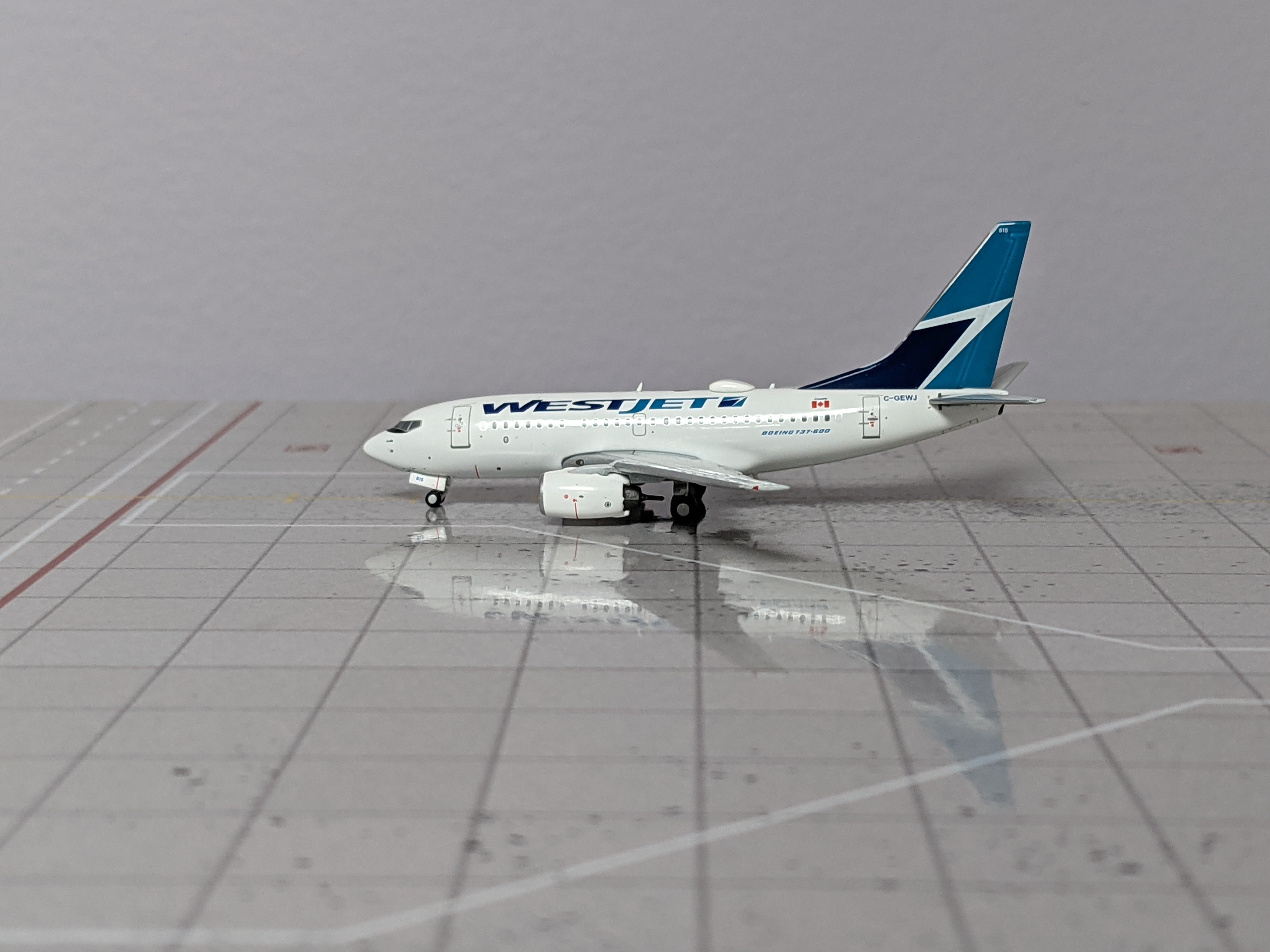 1:400 PANDA WESTJET B737-600 C-GEWJ